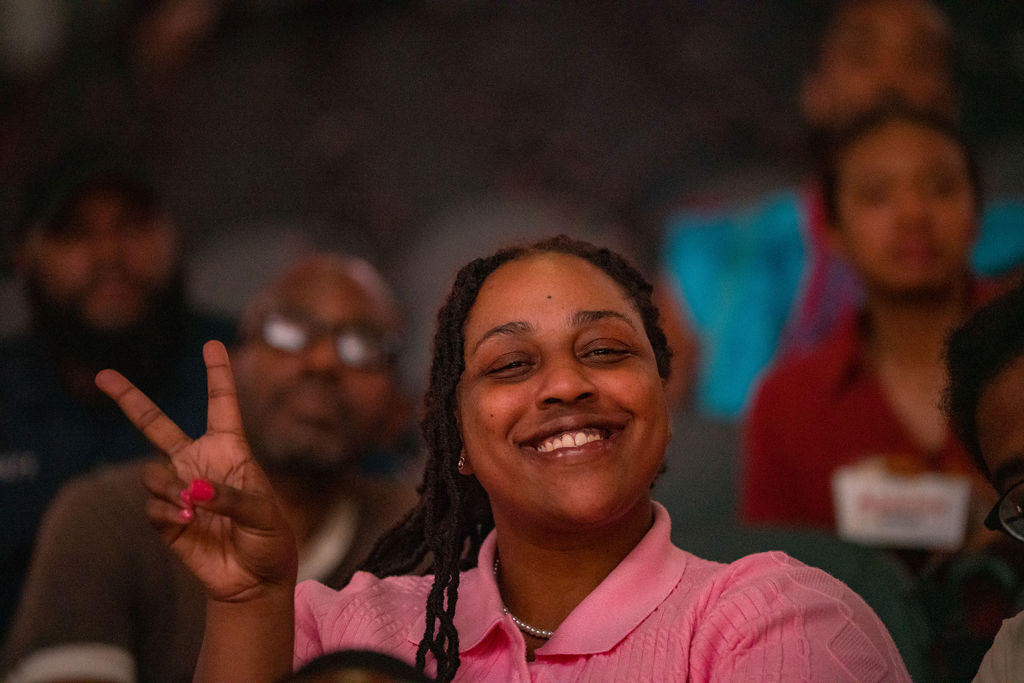 Attendee smiling at the event