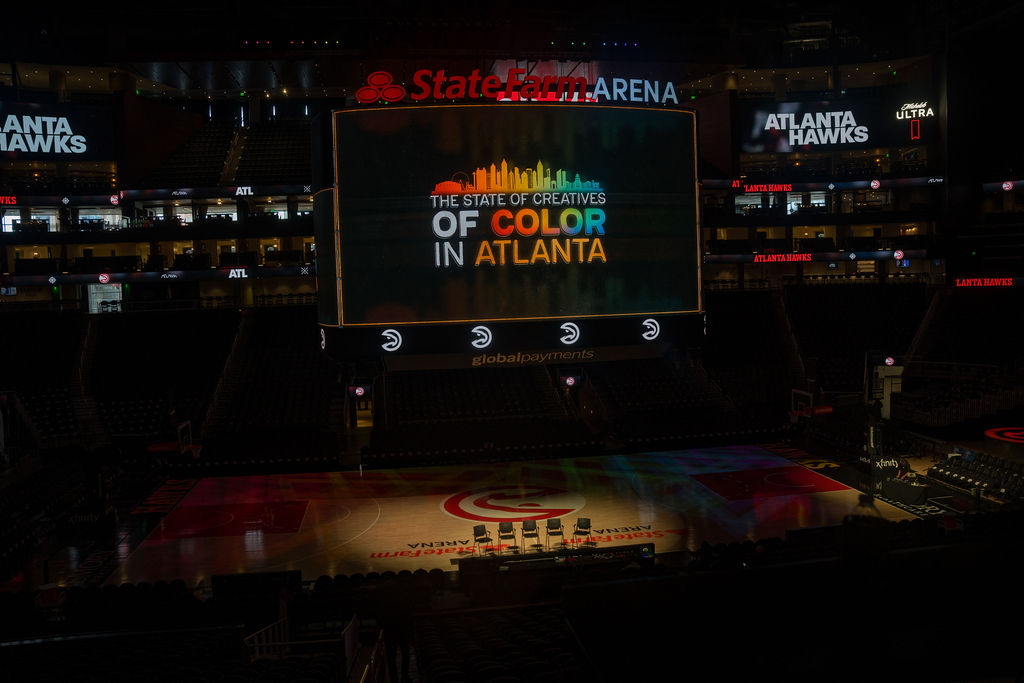 Creatives of Color Weekend branding on the State Farm Arena jumbotron
