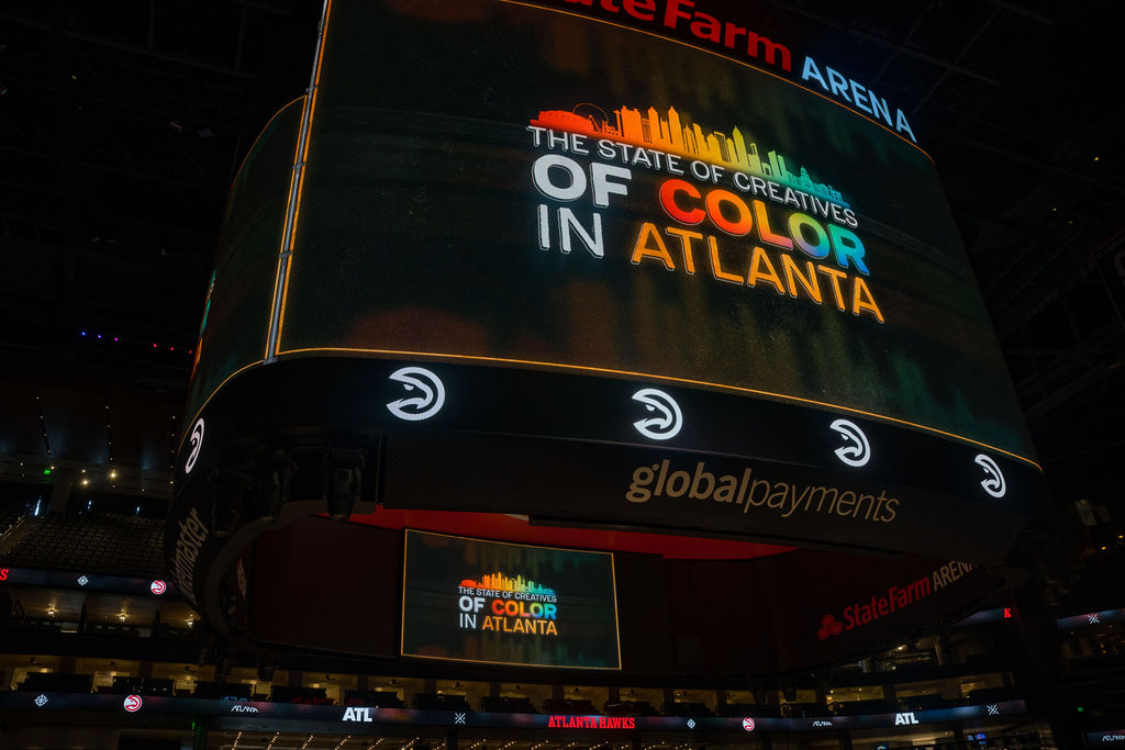 State Farm Arena jumbotron showing The State of Creatives of Color in Atlanta
